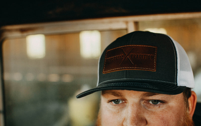 IT006 - Ind. Trad. Leather Patch Trucker Hat