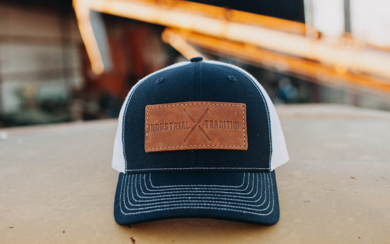 IT006 - Ind. Trad. Leather Patch Trucker Hat